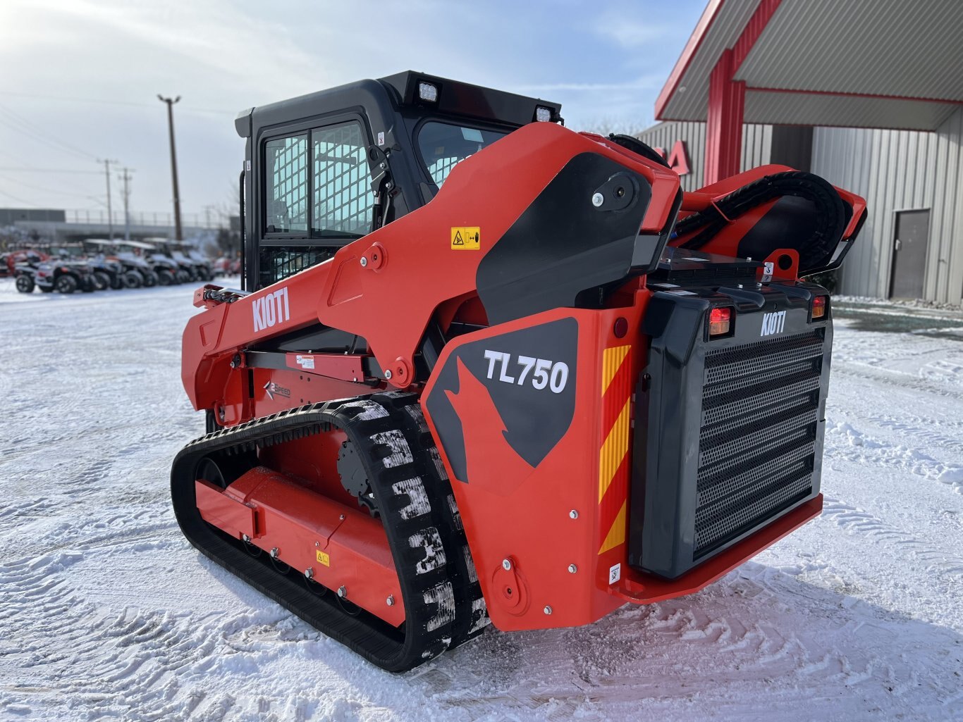 KIOTI Compact Track Loader | Model TL750 Flow+ Cab | Width 70.9" | Length 116.1" | Height with Cab 81.9" | Hydraulic Flow 34 GPM | For Heavy-Duty Tasks