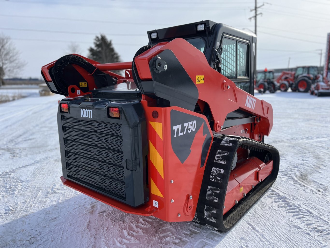 KIOTI Compact Track Loader | Model TL750 Flow+ Cab | Width 70.9" | Length 116.1" | Height with Cab 81.9" | Hydraulic Flow 34 GPM | For Heavy-Duty Tasks