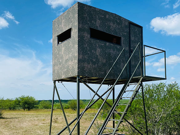 AWS Blind | Bushlan Outfitter Hunting Blinds | Models 5x5, 5x7 & 5x9 | Widths 60", 84" & 108" | Tower Heights Ground, 4', 8' & 12' | All-Metal Build | Combo Bow/Rifle Windows | For Deer Hunting