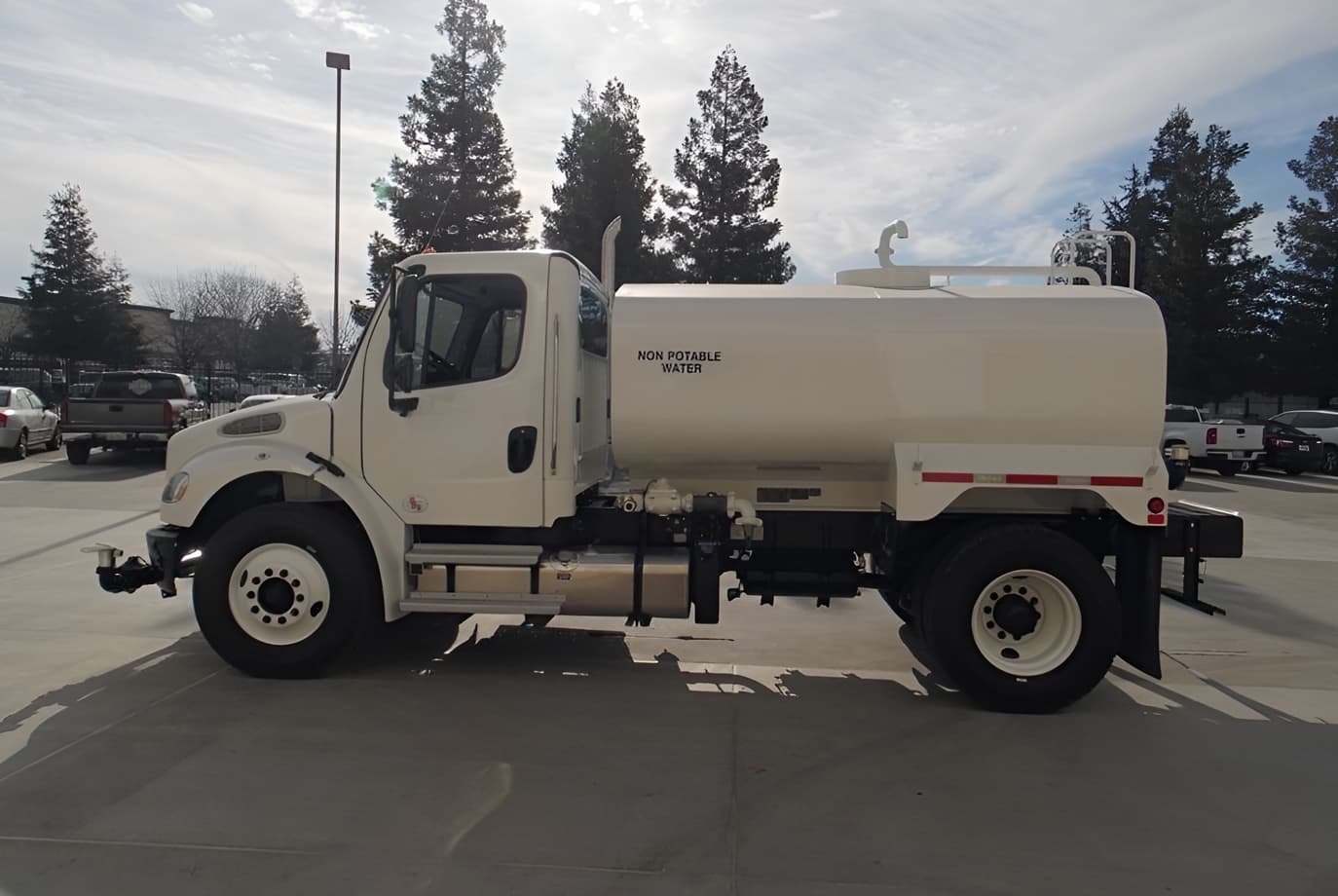 Freightliner | 2K Water Truck | M2 106 Model | 18' Tank Length | 2,000 Gallon Capacity | 102" Width | For Dust Control & Construction Sites
