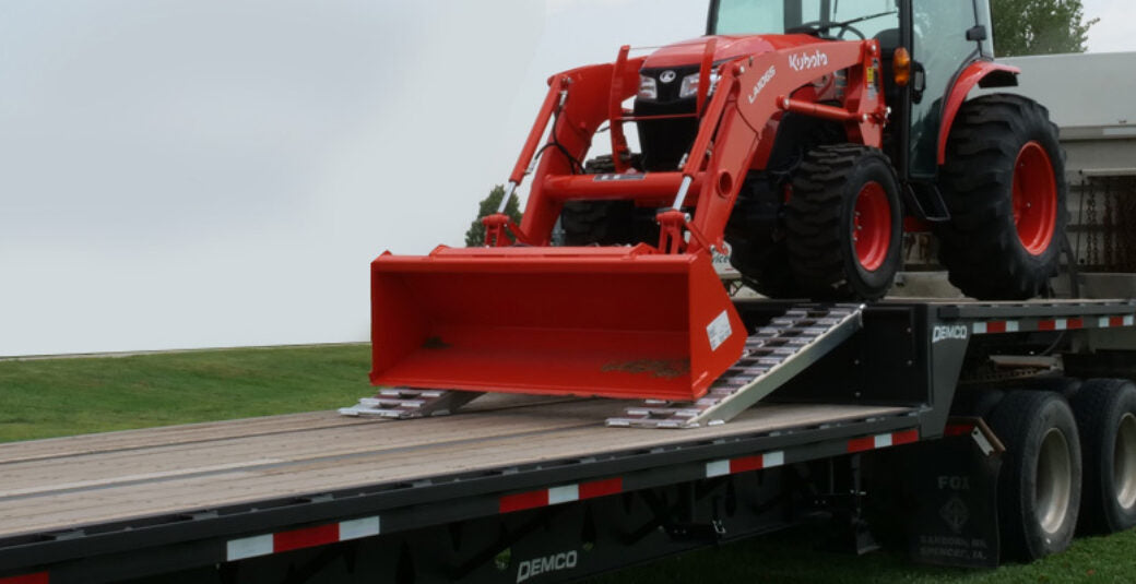 Demco | Tandem Axle Steel Drop Deck Trailer | Model DD43-5 & DD48-5 | Width 102" | GVWR 68,000–80,000 lbs | 5' Beaver Tail with Twin Ramps | Horsepower 400 To 700 HP | For Tractor