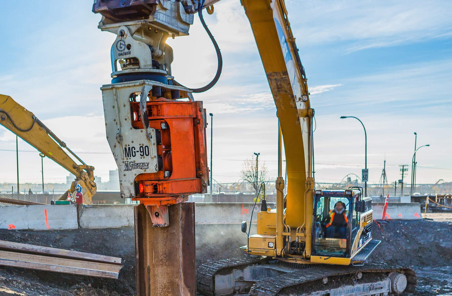 Gilbert Grizzly Multigrip Side-Grip Vibratory Hammer | Model MG-60 & MG-90 | Height 83" & 92" | Machine Size 22-45 Ton | For Excavators