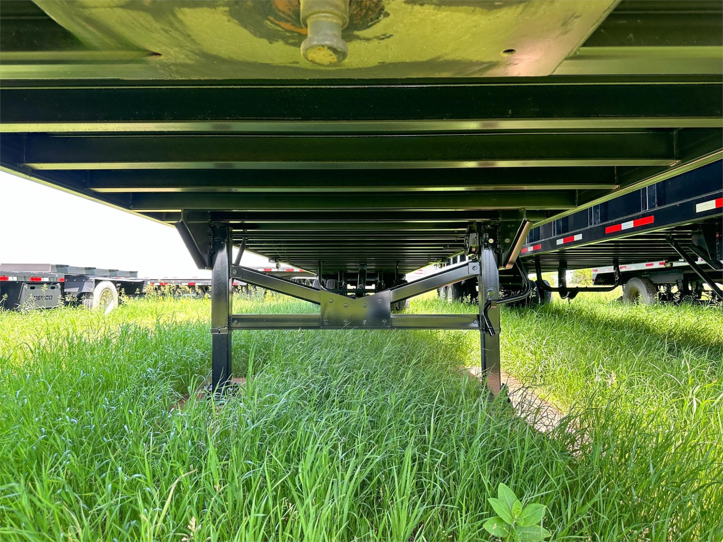 Demco Gondola Scrap Trailers | 48' Trailer Length | Capacity 113 cu yd | Tare Weight 20,000 Pounds | Horsepower 350–400 HP | For Tractors