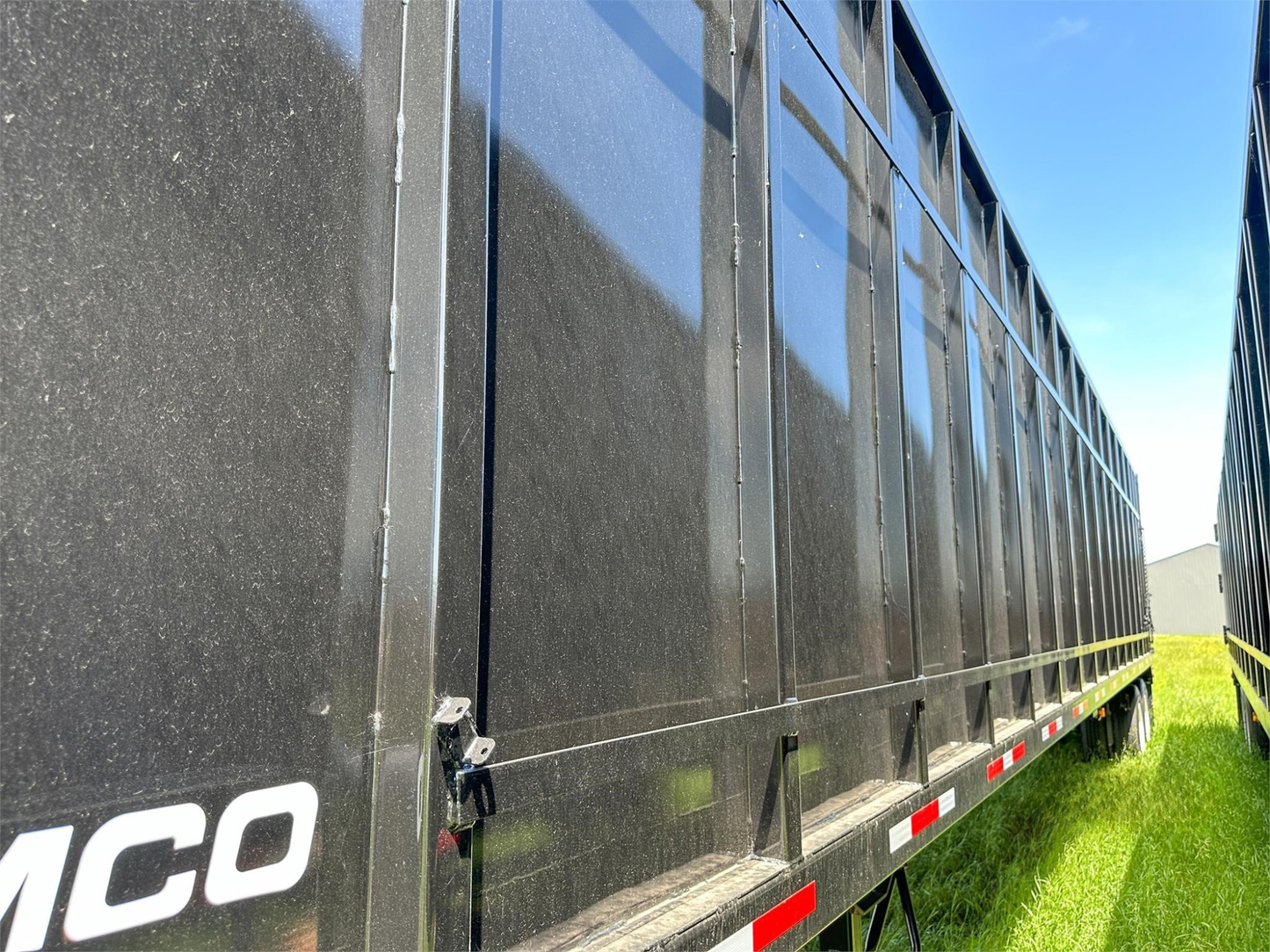 Demco Gondola Scrap Trailers | 48' Trailer Length | Capacity 113 cu yd | Tare Weight 20,000 Pounds | Horsepower 350–400 HP | For Tractors