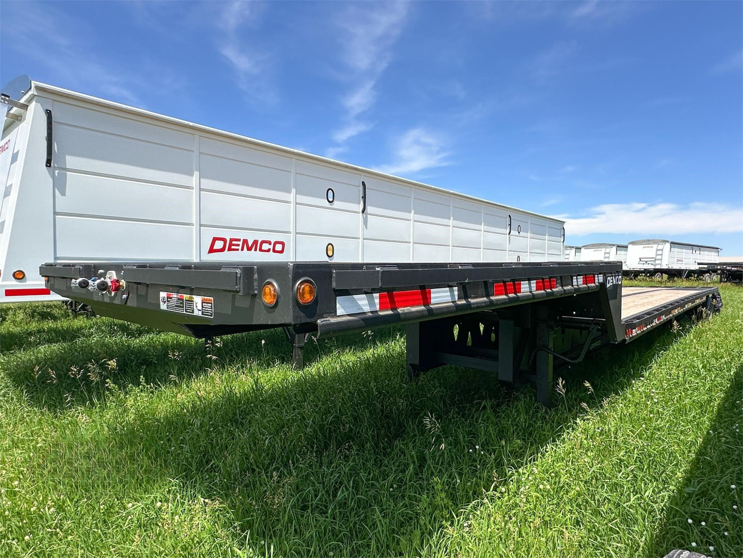 Demco | Tandem Axle Steel Drop Deck Trailer | Model DD40-5 & DD45-5 | Length 40ft To 45ft | GVWR 68,000 lbs | Horsepower 350-400 HP | For Tractor
