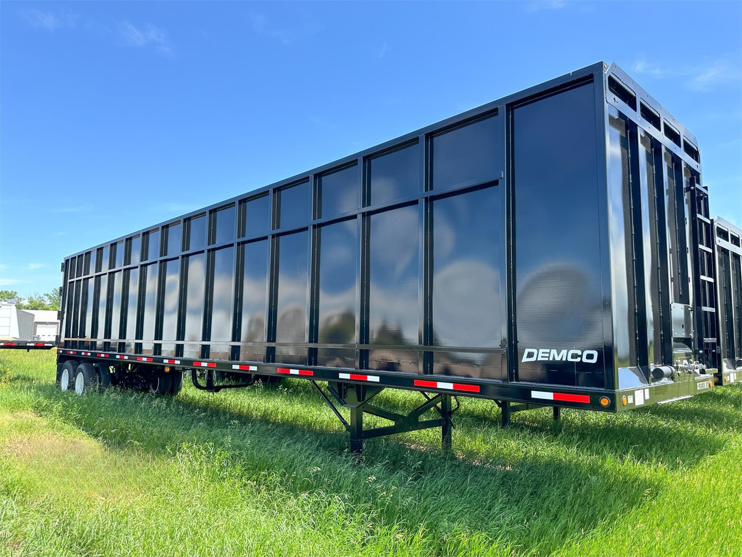 Demco Gondola Scrap Trailers | 48' Trailer Length | Capacity 113 cu yd | Tare Weight 20,000 Pounds | Horsepower 350–400 HP | For Tractors