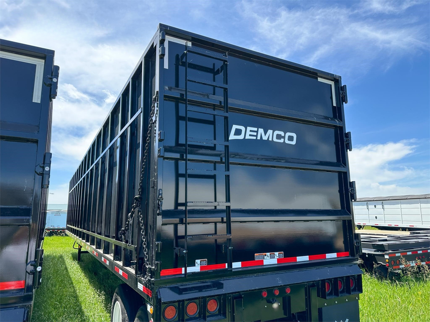 Demco Gondola Scrap Trailers | 48' Trailer Length | Capacity 113 cu yd | Tare Weight 20,000 Pounds | Horsepower 350–400 HP | For Tractors