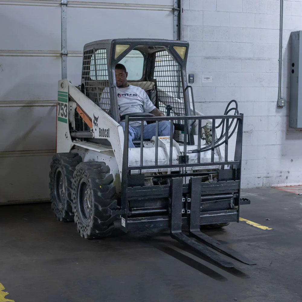 Titan Attachments Hydraulic Pallet Fork | 36″–60″ Blades | 8″–40″ Spread | 4,000 lb Capacity | SSQA Compatible | 10–25 GPM | For Skid Steers