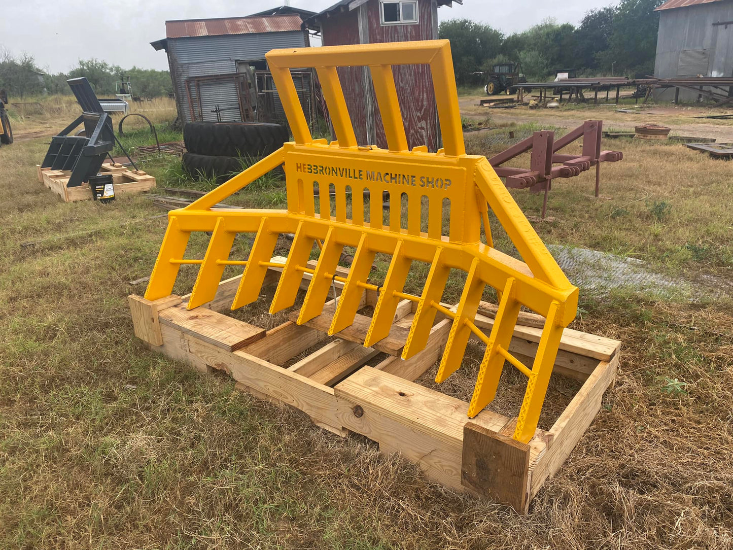 HEBBRONVILLE MACHINE SHOP 8’ & 12’ WNGED SKID-STEER STACKING RAKES FOR SKID STEER