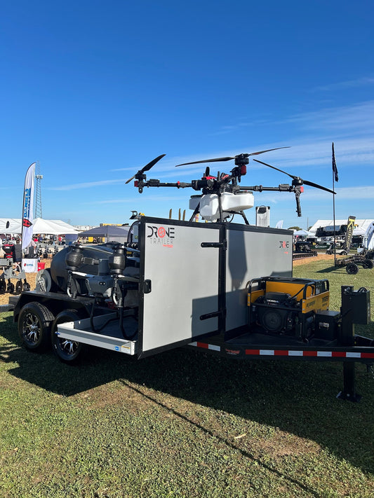 Drone on a trailer at an outdoor event with clear blue sky