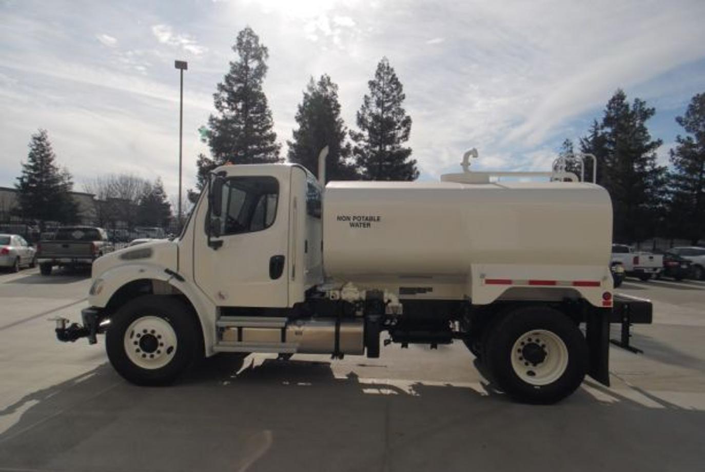 Freightliner M2 106 Water Truck | Tank Capacity 2,000 Gallons | Overall Length 18' | Width 102" | Horsepower 250 HP | 2500 RDS Automatic Transmission