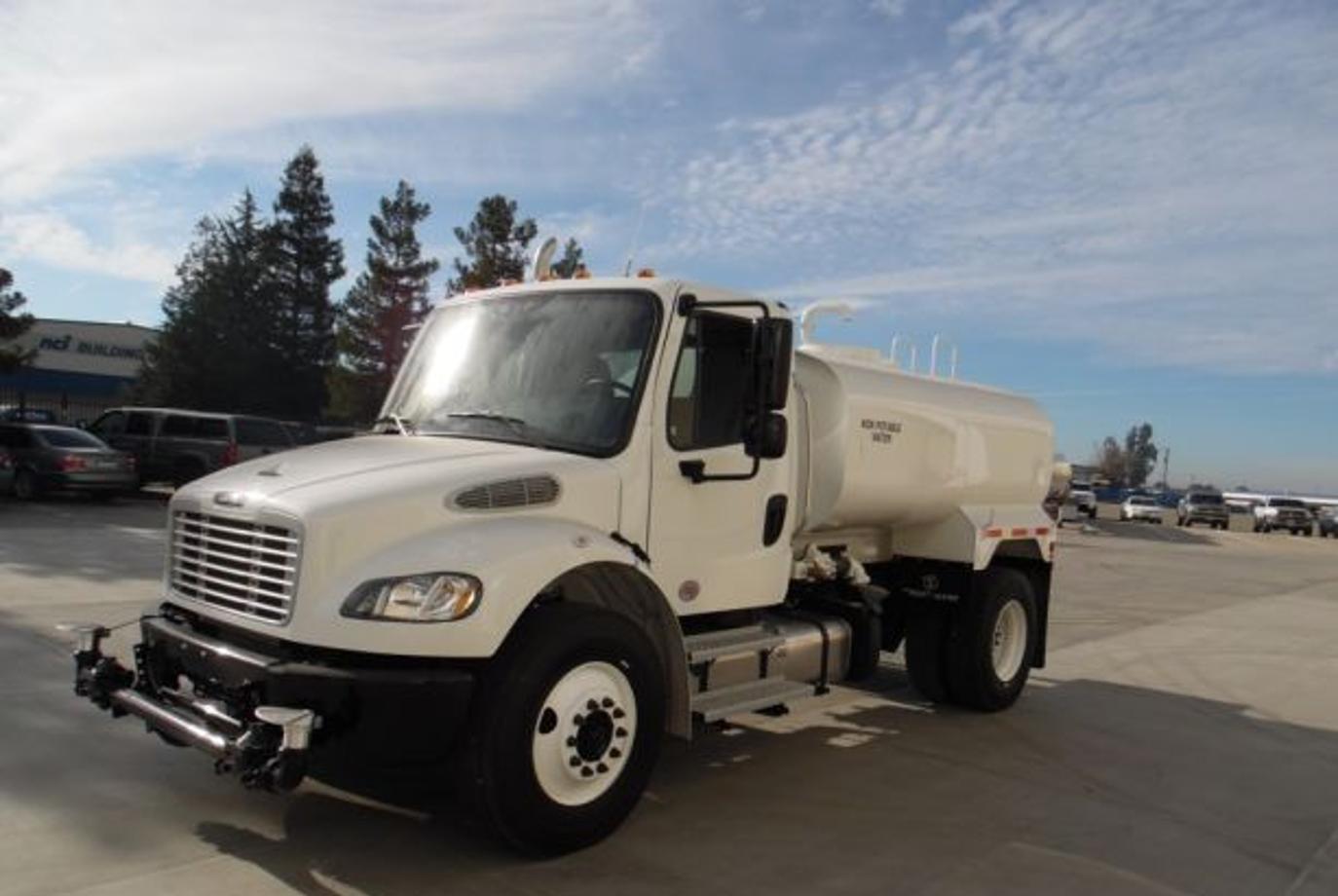 Freightliner M2 106 Water Truck | Tank Capacity 2,000 Gallons | Overall Length 18' | Width 102" | Horsepower 250 HP | 2500 RDS Automatic Transmission