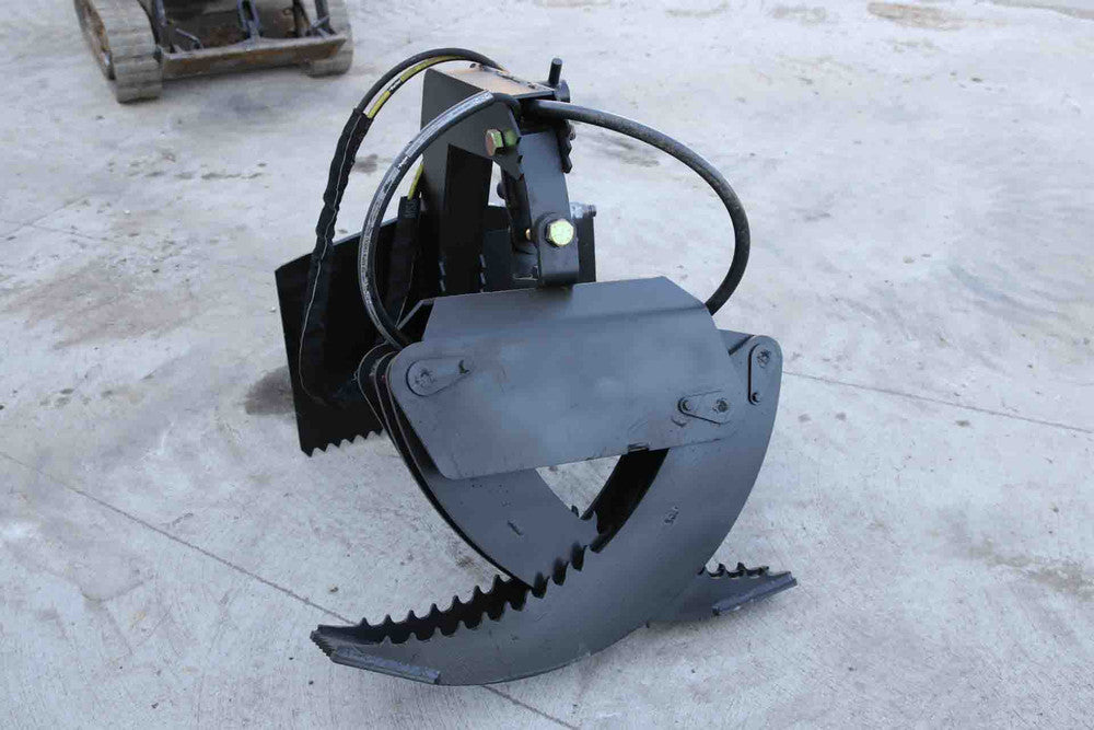 Express Steel | Log Grapple | Model Toro Dingo Manual Rotation | SKU ES22720 | Opening Width 66" | Capacity 2,000 lbs | Hydraulic Flow Requirement 10 To15 GPM | For Skid Steers
