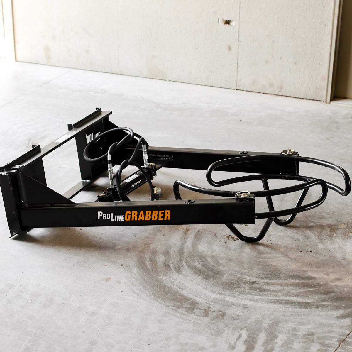 ProLine Tree Planting Equipment | Model Grabber XL | Width 54" | Rootball Capacity 32"-54" | Reach 8' | Hydraulic Flow Range 15–25 GPM | For Skid Steers