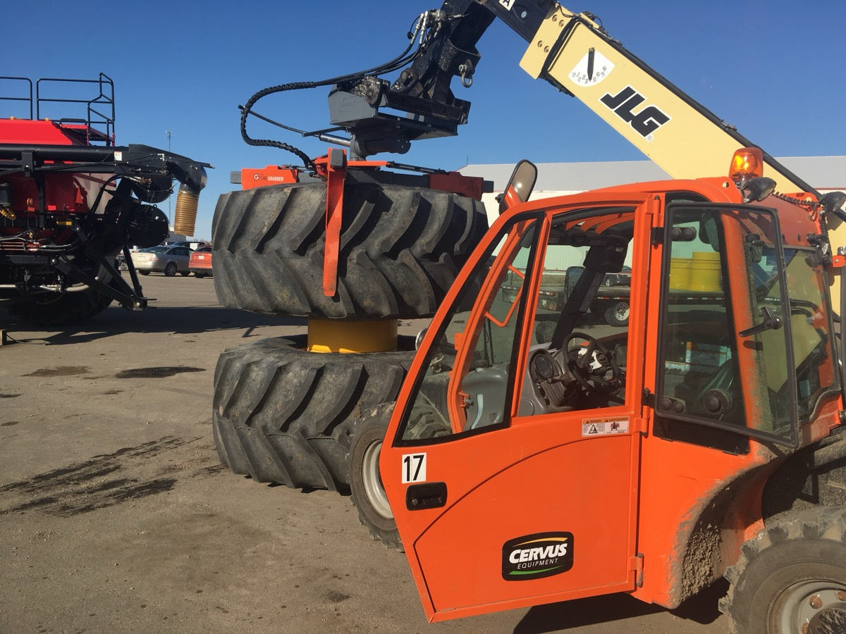 The Tire Grabber Tire Handler | Model TG4000 | Width 83" | Capacity 4000 lb | 10 To 20 GPM | 40 To 100 HP | For Skid Steer, Tractor & Loader