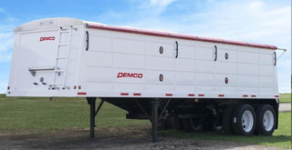 Demco | Steel Hopper Bottom Grain Trailer | Model Length 24' | Capacity 810 Cubic Feet | Weight (Air-Ride) 6,840 lbs | Horsepower 250–280 HP | For Tractor