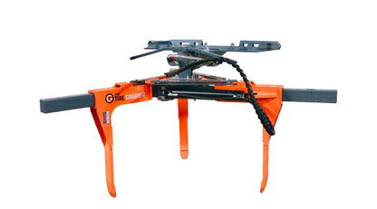 The Tire Grabber Tire Handler | Model TG4000 | Width 83" | Capacity 4000 lb | 10 To 20 GPM | 40 To 100 HP | For Skid Steer, Tractor & Loader