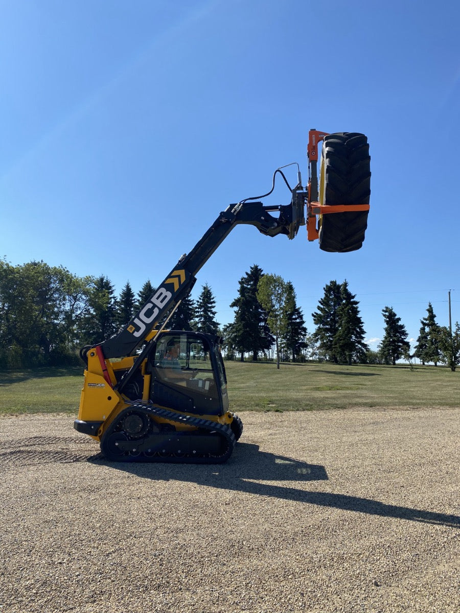 The Tire Grabber Tire Handler | Model TG4000 | Width 83" | Capacity 4000 lb | 10 To 20 GPM | 40 To 100 HP | For Skid Steer, Tractor & Loader