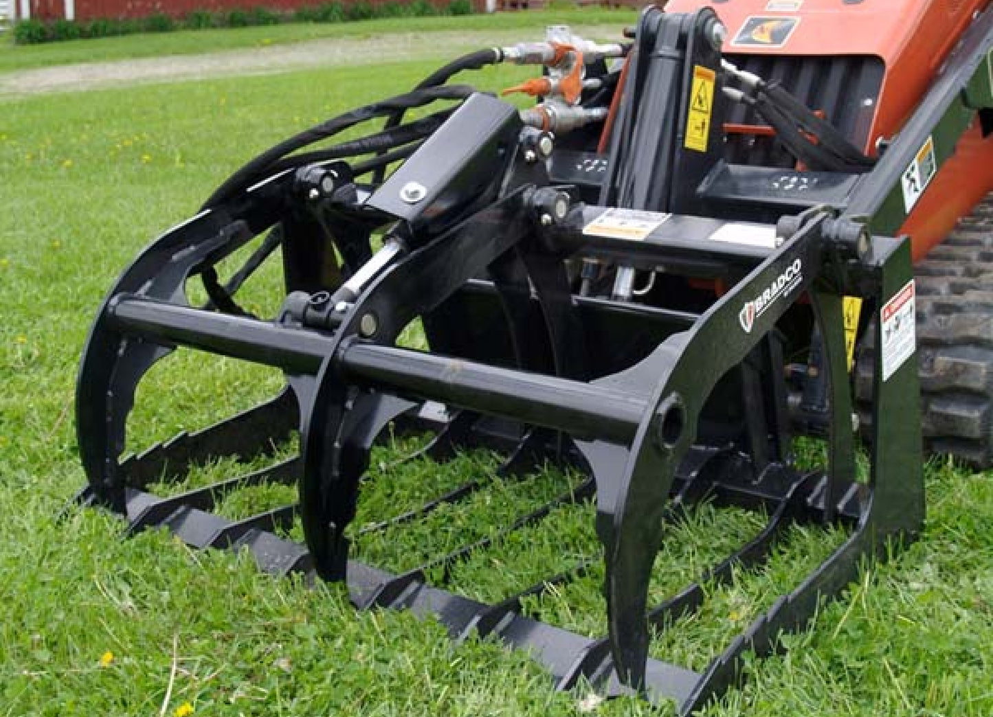 Paladin Brush Grapple | Working Width 72"–84" | Severe-Duty Open Bottom | 15-20 GPM | For Skid-Steer Loaders