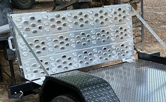 Heavy Duty Ramps Bi-Fold Landscaping Trailer Ramps | Model F05-69-048-HINGE | Size 48" L x 69" W | Capacity 5,000 lb. Per Axle | Horsepower 23 HP | For Trailers