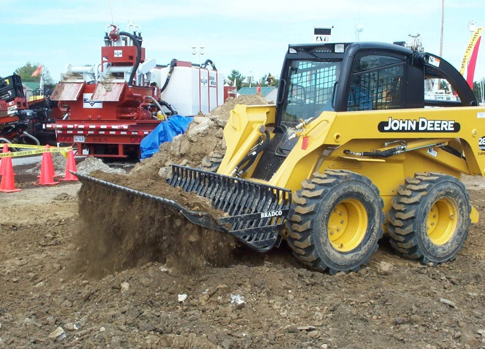 Paladin Rock Bucket | Width 66"-84" | 2" & 3" Tine Spacing | 15-25 GPM | For Skid Steer