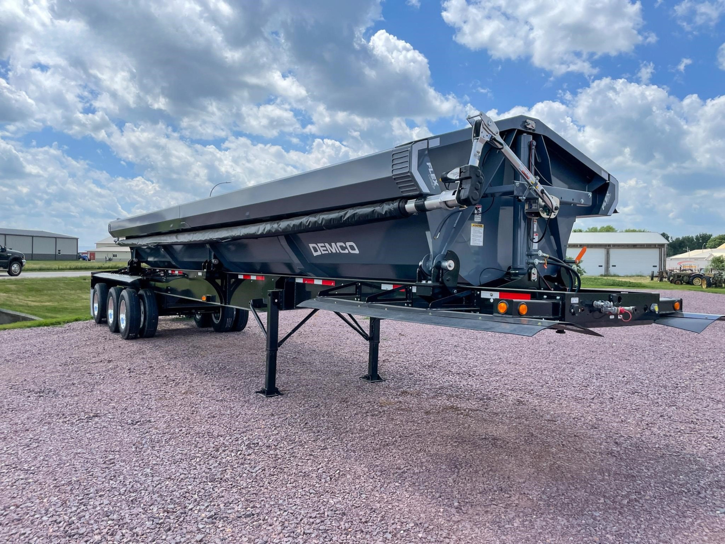 Demco Triple Axle Side Dump Trailers | Tub Length 34 ft | 128" Lowa Spread Axle | Anti-Corrosion Coating | For Tractors