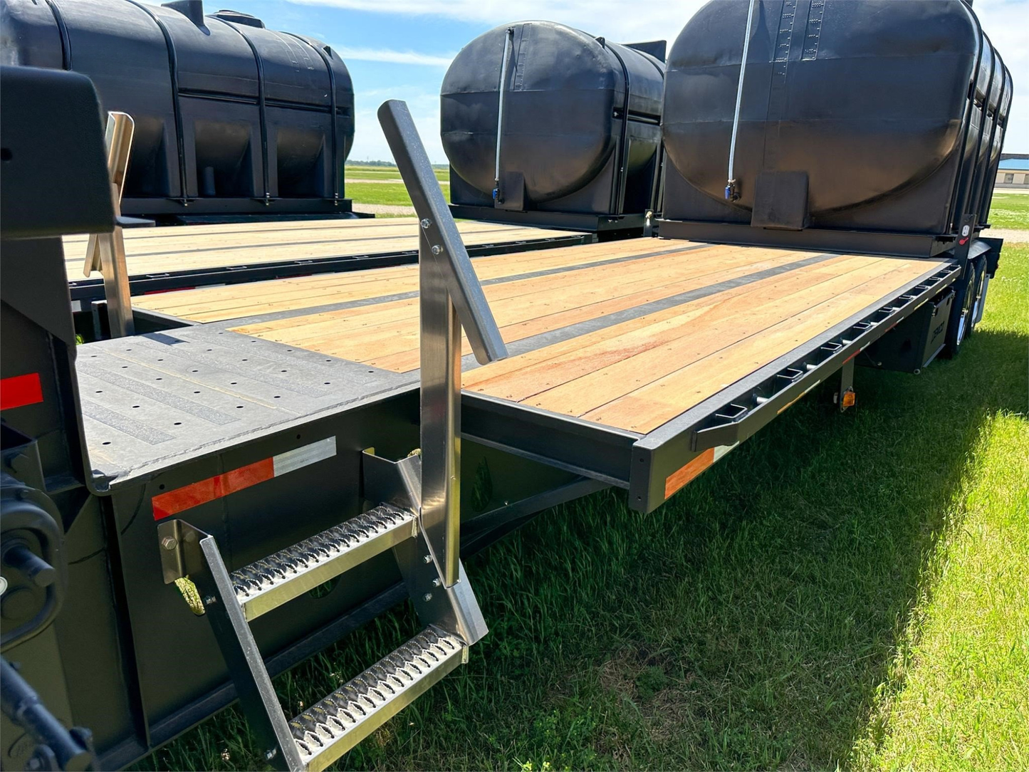 Demco Liquid Tender Trailer | Trailer Length 48' | Dual 3250 Gallon Tanks | Front/Rear Aux Power & Air Couplers | For Tractors