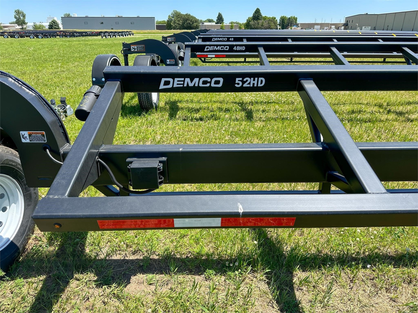 Demco Heavy Duty Combine Header Transport Trailers | Model HT52HD | Dimension 62’6” | GVW 20,000 lbs. | For Tractors