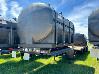 Demco | Liquid Tender Trailer | Model Length 36' | Width 102" | Capacity 55,000 lbs | 24” King Pin | Brake Size 16.5” x 7” | Horsepower 280–300 HP | For Tractor