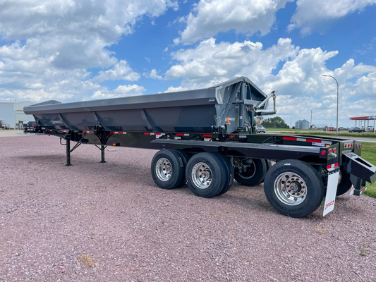 Demco | Triple Axle Side Dump Trailer | Model Length 34' | Capacity 22.7 Cubic Yards | Weight 17,000 lbs | Horsepower 350–400 HP | For Tractor