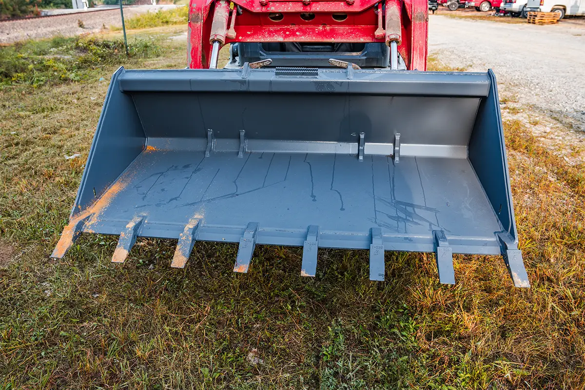 Solesbee’s Tooth Bucket | Model SSLB-T Series | Widths 66" – 84" | 8–30+ GPM | For Skid Steers
