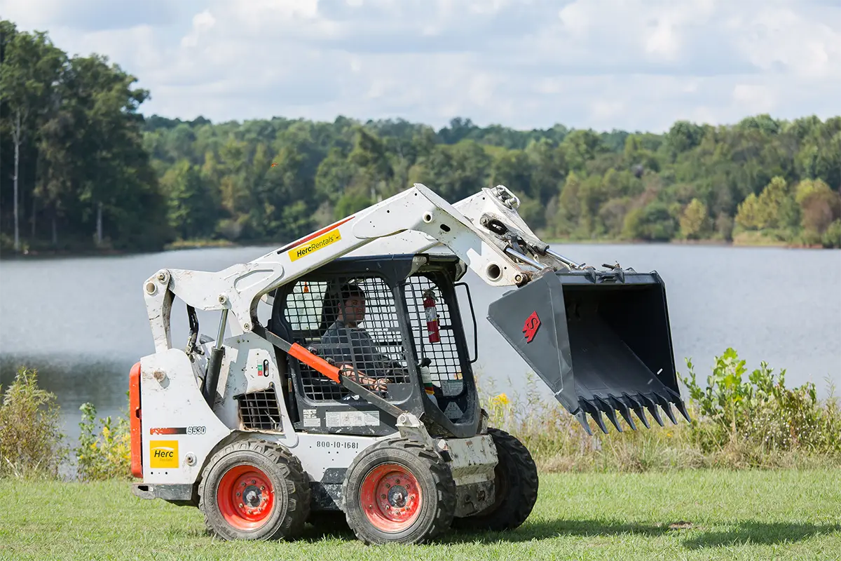 Solesbee’s Tooth Bucket | Model SSLB-T Series | Widths 66" – 84" | 8–30+ GPM | For Skid Steers