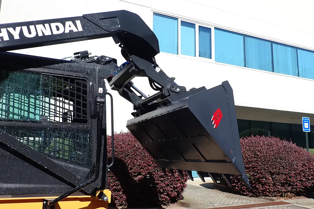 Solesbee’s Tooth Bucket | Model SSLB-T Series | Widths 66" – 84" | 8–30+ GPM | For Skid Steers