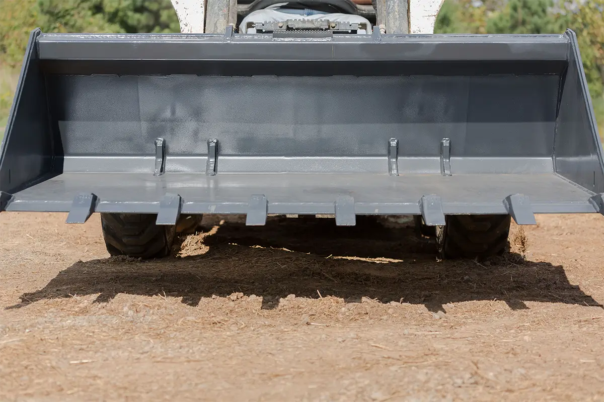 Solesbee’s Tooth Bucket | Model SSLB-T Series | Widths 66" – 84" | 8–30+ GPM | For Skid Steers
